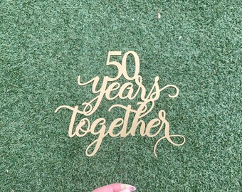 50th Anniversary Cake Topper reads: 60 years together