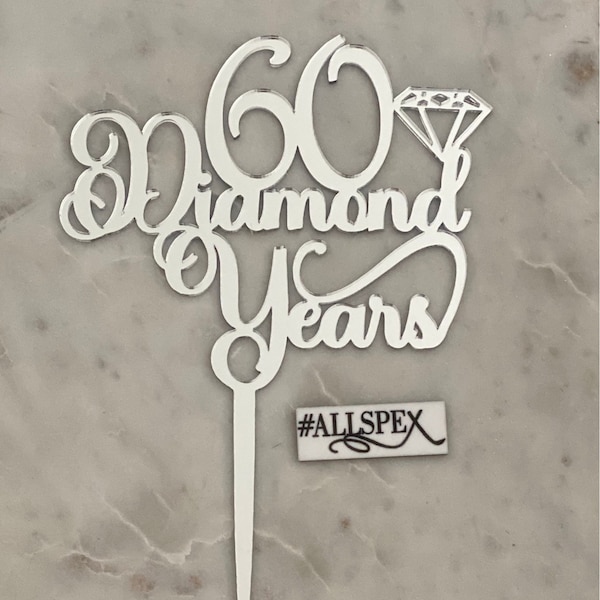 60th Wedding Anniversary Cake topper read: 60 Diamond Years