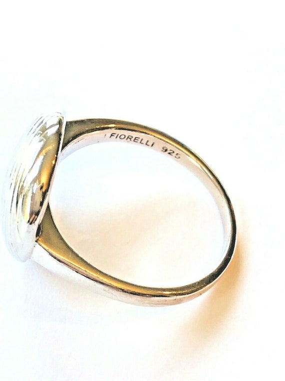 Hermoso anillo de plata primera ley estampado FIORELLI -