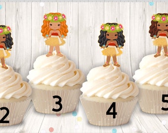 May include: Four cupcakes with white frosting, each topped with a cartoon figure of a girl in a grass skirt and flower crown. The figures have different hair colors: black, red, and brown. Numbers 2, 3, 4, and 5 are printed on the cupcake wrappers.