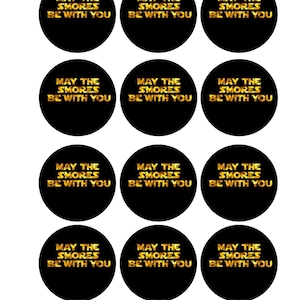 May include: A sheet of twelve black circular stickers with gold text that reads "MAY THE SMORES BE WITH YOU". The stickers are arranged in three rows of four.