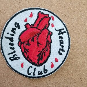 Iron-on Bleeding Heart Club Embroidered   Upcycled Canvas Patch
