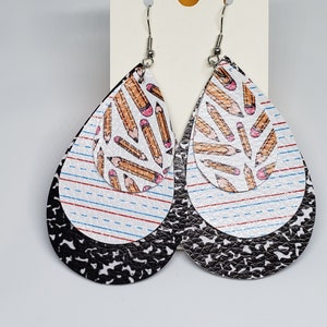 Cute teacher dangles