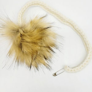 Pin am Löwenschwanz