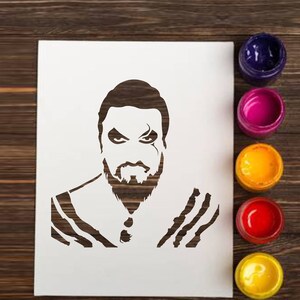 May include: A stencil of a man's face with a beard and a striped pattern around the neck and shoulders. The stencil is on a white background.