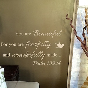 May include: A beige wall with a white vinyl decal that reads "You are Beautiful. For you are fearfully and wonderfully made... Psalm 139:14".