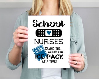 May include: White printable sign with black text that reads "School Nurses Saving the World One Ice Pack at a Time!"  The sign features a blue heart and a black and white bandage.