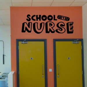 May include: A black and white sign on an orange wall that reads "SCHOOL NURSE" with a heart and a bandage graphic.