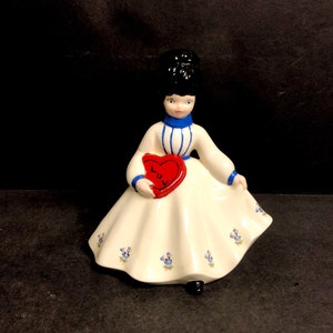 Vintage Porcelain/Ceramic Girl Holding Heart Music Box Figure -Nice!