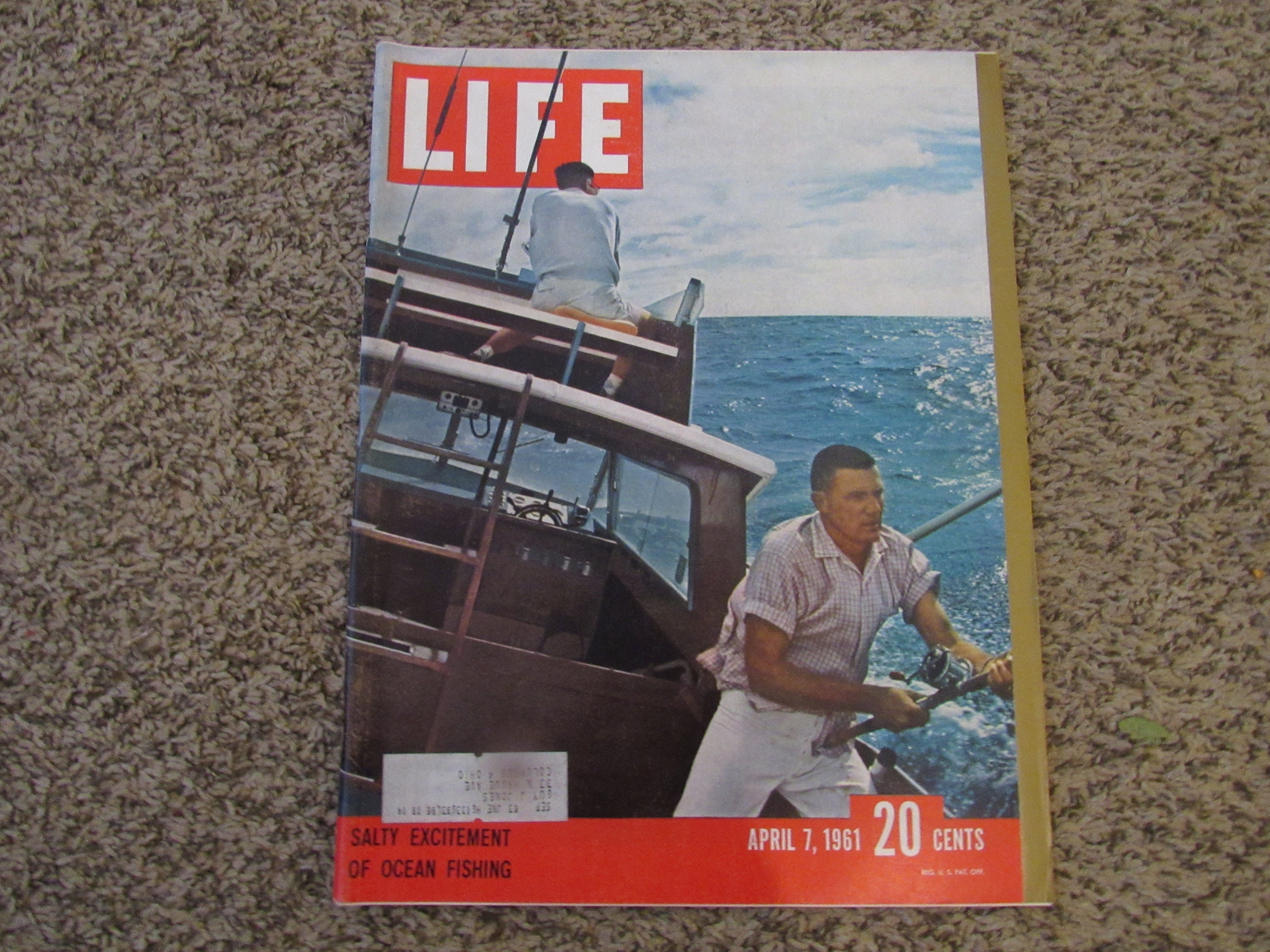Vintage Magazine ad - Johnson Centennial fishing reel ca 1950s