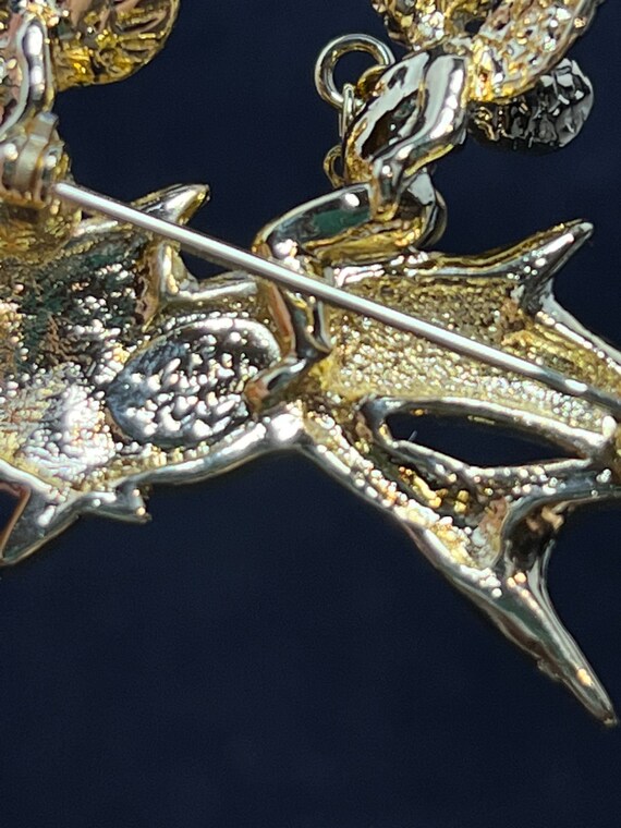 A&S】イルカのゴールドトーンブローチ カークス フォリー ゴールド