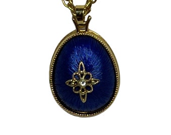 Avon Gold Tone Necklace With Blue Enamel and Rhinestone Egg