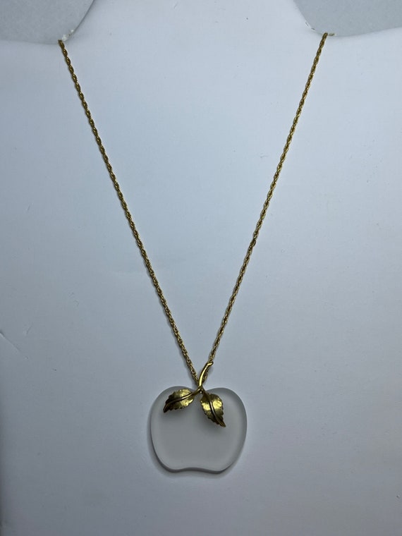 Avon Gold Tone Rope Chain Necklace With Apple Pen… - image 1