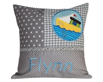 Cuddly pillow with boat and desired name