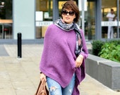 Poncho cape hand knitted in alpaca wool.