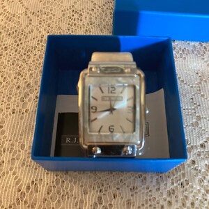 Ladies Watch Made By R.J. Graziano. . New, Never Been Used. In The Original Box.