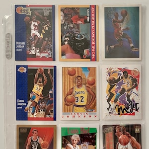 Lot d'une feuille de cartes de basket-ball Michael Jordan, Magic Johnson, Larry Bird 9 1990-1993