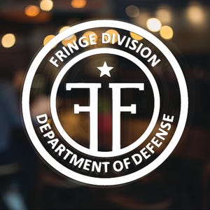 May include: White circle sticker with the text "FRINGE DIVISION DEPARTMENT OF DEFENSE" and a star above the letters "FF" in the center.