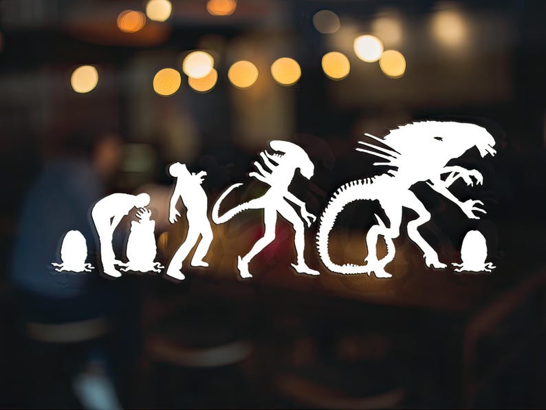 May include: A white silhouette of the evolution of the alien from the movie Alien. The silhouette starts with a single-celled organism and progresses through various stages of development, culminating in the iconic Xenomorph.