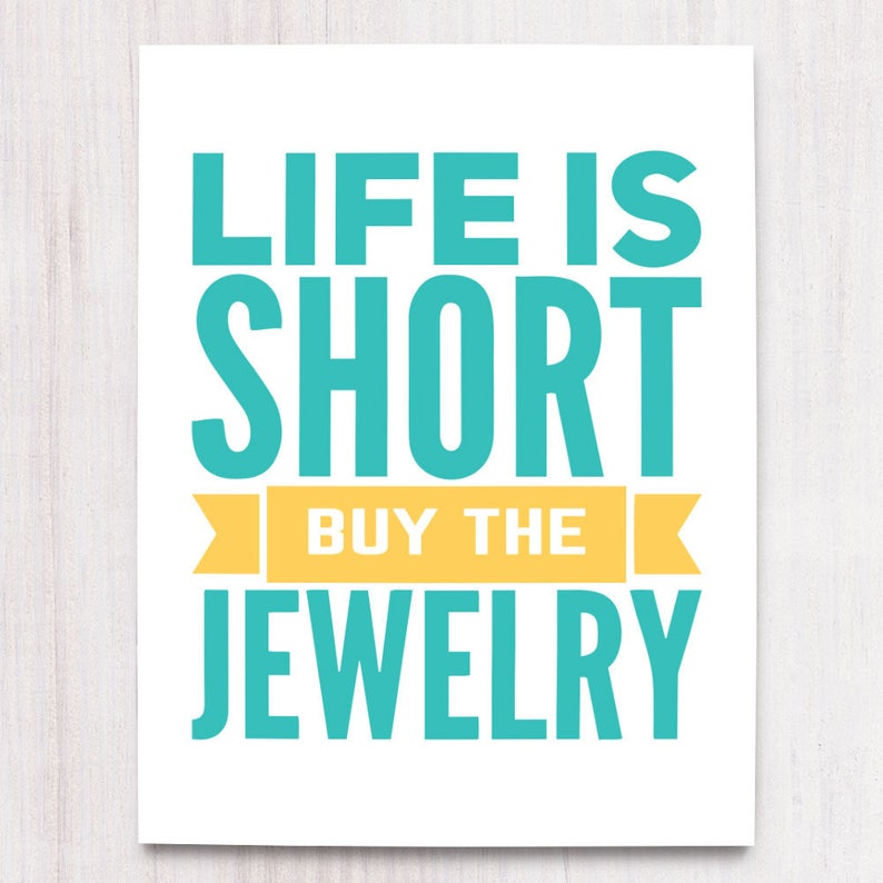 May include: A teal blue and yellow graphic print with the text "Life is short, buy the jewelry".