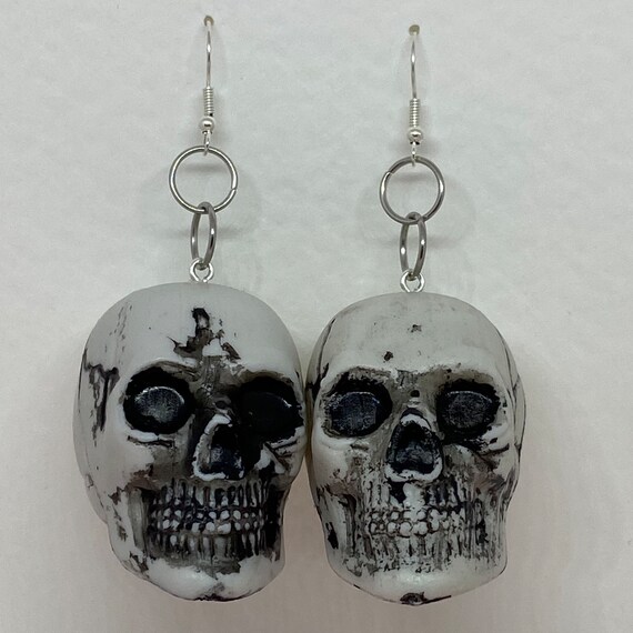 Large skull earrings deals