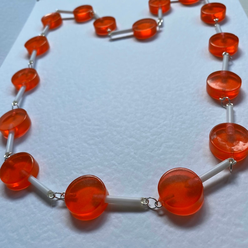 Orange round lollipop full chain Necklace 25 Inches long silver coloured chain