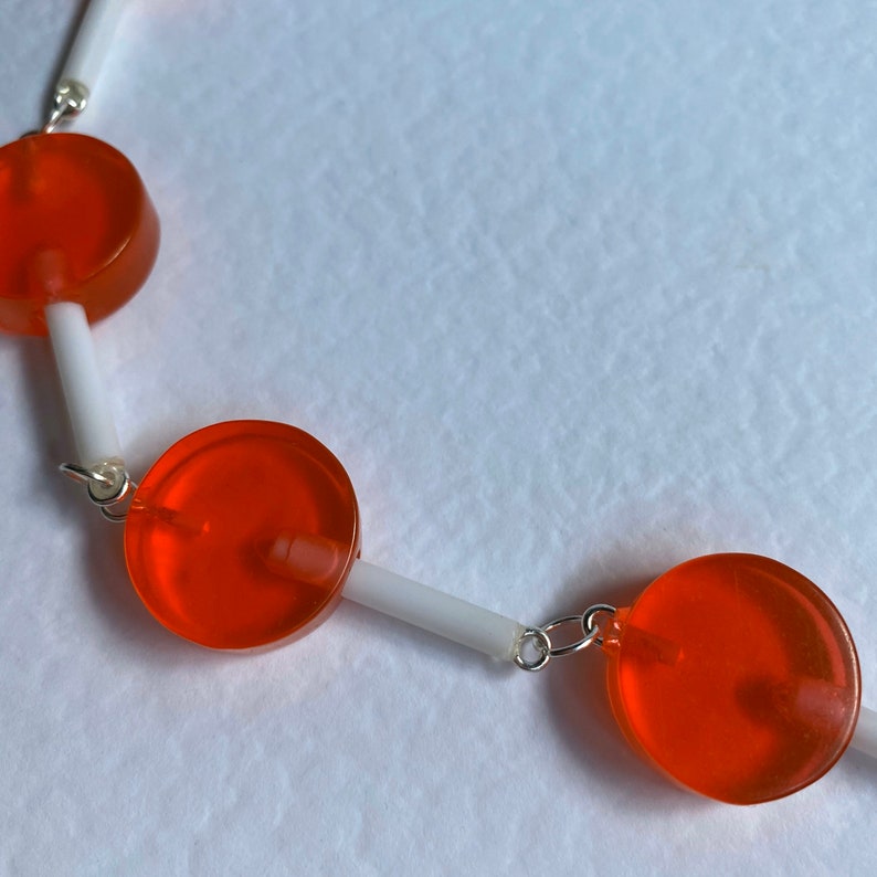 Orange round lollipop full chain Necklace 25 Inches long silver coloured chain