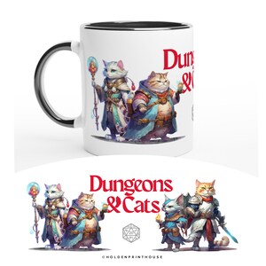 May include: White ceramic mug with a black rim. The mug features a colorful illustration of four cats dressed as fantasy characters. The text "Dungeons & Cats" is printed in red on the mug.