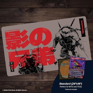 May include: A rectangular playmat with a gray background featuring a red Japanese text design and illustrations of Teenage Mutant Ninja Turtles. The mat is 24" x 14" and is designed for MTG and TCGs.