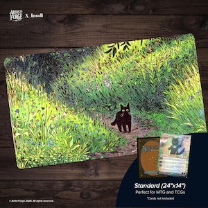 May include: A rectangular playmat featuring a vibrant illustration of a black cat standing on a dirt path surrounded by lush green grass and small wildflowers. The text Artist Forge X Inudi is printed in the top left corner of the image.