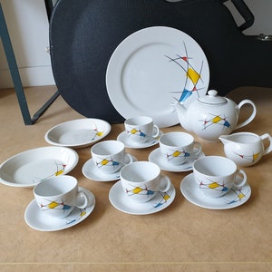 VEB Torgau, East Germany pottery, fifties/sixties abstract ceramic tea service and plates with mid-century decorations in primal colours