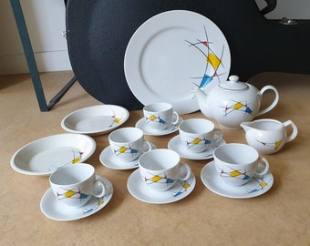 VEB Torgau, East Germany pottery, fifties/sixties abstract ceramic tea service and plates with mid-century decorations in primal colours