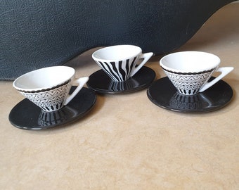 Asa Selection, three West-Germany pottery design espresso cups, demi-tasse, with 'African' tribal decoration in black and white, post-modern