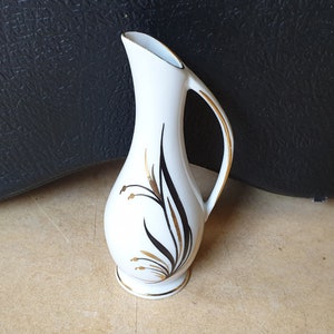 East Germany, unknown manufacturer: wonderful mid-century fifties porcelain mini vase with modern floral decoration, elegant china jug model