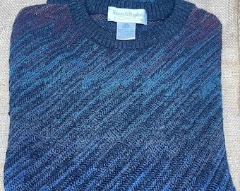 New in Box. Vintage Tricots St. Raphael Merino wool crewneck sweater in a blue, purple, and green pattern made in Uruguay. Medium