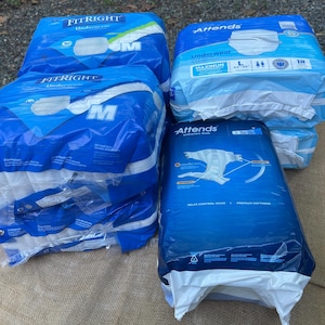 May include: Two packages of FitRight underwear in size M and two packages of Attends products, including one pack of size L underwear and one pack of bariatric briefs, all in blue and white plastic packaging with printed product information.