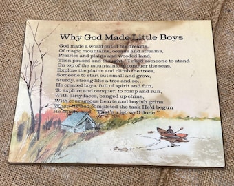 Vintage-style wall plaque features the poem "Why God Made Little Boys" illustrated with a rustic scene of a canoeist and a tent.