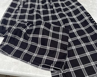 Pantalón ancho tipo Dolly de Torrid Studio Ponte, con estampado de cuadros, para mujer, talla grande 3/3X, color negro elástico.