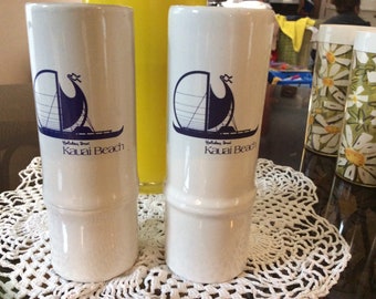 2 Tropical Drink 10 oz Tumblers Holiday Inn Kauai Beach. Copyright DAGA Hawaii. Featuring Holiday Inn logo deep blue outrigger design