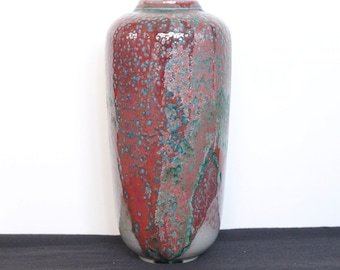 Beautiful large art pottery vase by artist Andreas Becher, West Germany, around 1980. Green blue speckles on deep red colour glaze. Vintage