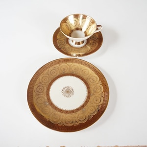 Great solar pattern! Vintage porcelain tea trio set cup, saucer, plate. Gold brown. Winterling Marktleuthen Bavaria Germany. Sammeltasse