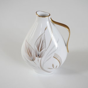 Fine white porcelain vase with tender leaves in gold lines. Eschenbach Bavaria Germany, 1930 -1950. Beautiful vintage home decoration
