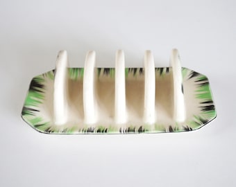 Rejilla para tostadas de cerámica pintada a mano de principios de la década de 1930. Decoración a rayas, Stricheldekor, Majolika Alemania. Cerámica verde/negra sobre beige. Artículo de coleccionista