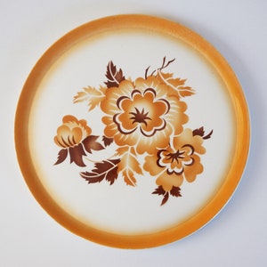 assiette à gâteau / plateau à pizza en céramique vintage des années 1930, Colditz AG Allemagne, poterie. Aérographe / Spritzdekor décor floral abstrait, brun orange