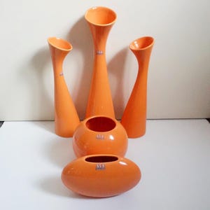 3 high and 2 round orange ceramic ASA Selection Germany vases. Wonderful strong minimalist design. Great condition. Vintage 1980s pottery