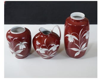 2 x White and silver flower, deep red porcelain vase, VEB Lippelsdorf GDR / DDR Spechtsbrunn Thuringia Porzellan. Vintage East Germany 1960s