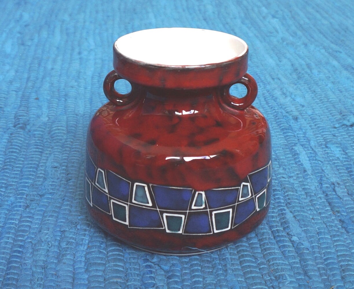 Modernist art pottery. Red vintage vase CEMAS Florence, Italy. Abstract decor. Italian mid-century modern elegance