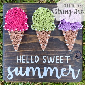 May include: DIY string art kit featuring three ice cream cones with the text "Hello Sweet Summer" on a wooden background.