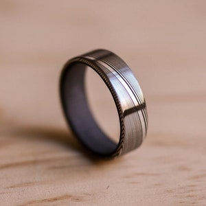 Damasteel Damascus ring with Carbon Fiber, Dense Twist Pattern, Damascus Steel Wedding Band, Damasteel Ring