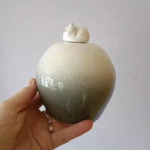Cat urn - White/grey and White cat on top